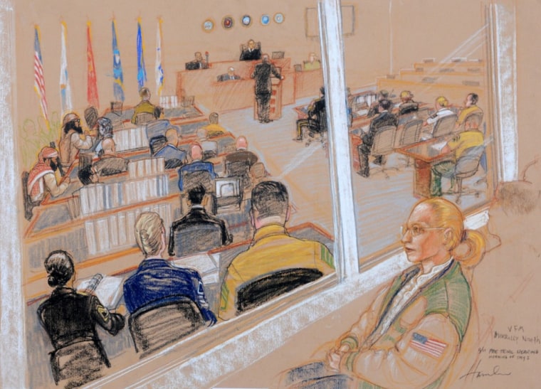 Merrilly Noeth, a relative of a victim of the Sept. 11 attacks, is pictured watching from behind sound-proof glass on the second day of the Military Commissions pretrial hearing for the five men accused of planning the attacks, at Guantanamo Bay U.S. Naval Base in Cuba, on Tuesday. Only two of five suspects were present in the second day of the proceedings--Yemenis Walid bin Attash and Ramzi Binalshibh.