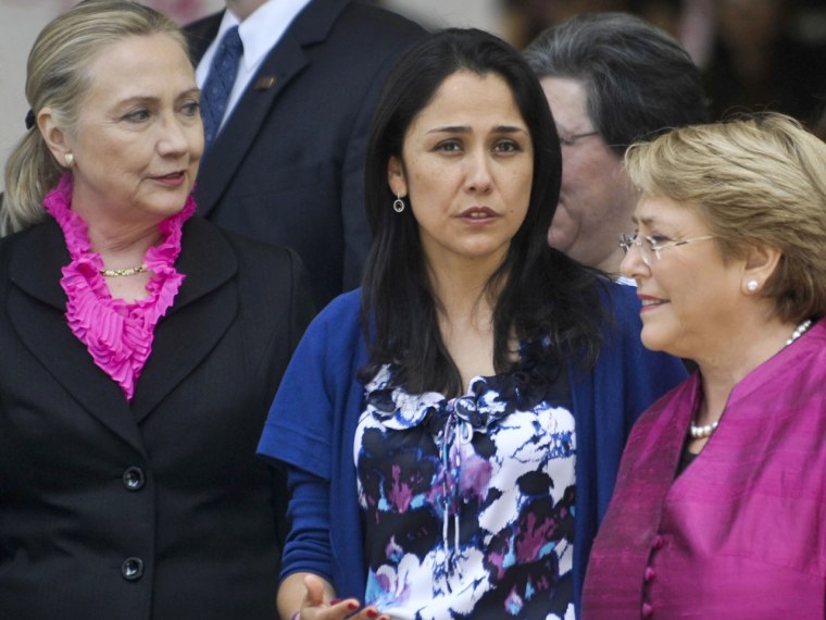 Secretary of State Hillary Clinton, as well as United Nations Women Executive Director Michelle Bachelet (photographed in Lima) both chose the hot hue Tuesday, too. Was there a memo the rest of us missed?