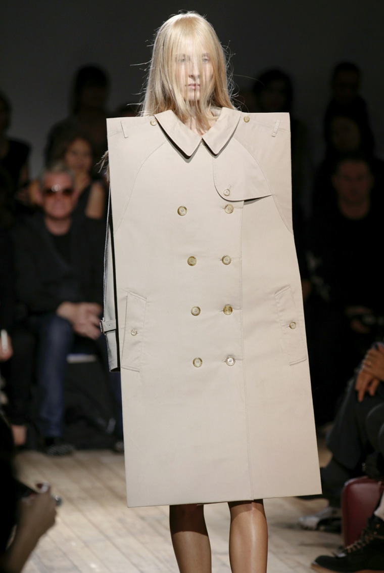 A bold look from the Maison Martin Margiela Spring/Summer 2011 show is modeled during Paris Fashion Week on Oct. 1, 2010. The designer brand is now releasing an affordable line for retailer H&M.