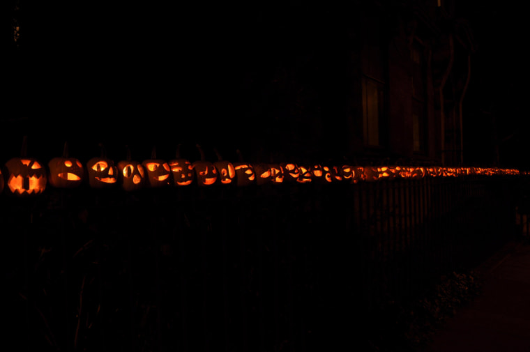 Jane Greengold likes to take her time with the pumpkins she carves, giving them smaller, spooky features. They are lit up on Halloween night with electric lights.