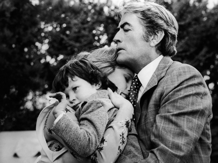 Gregory Peck has his hands full with young Damien (Harvey Stephens) in 1976's