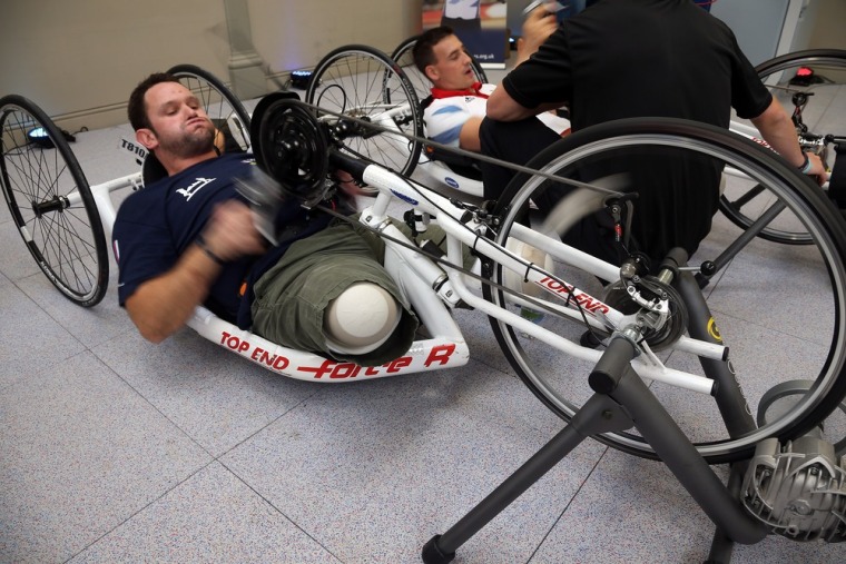 Military amputee Steve Arnold uses a hand bike in the new Help for Heroes' Tedworth House rehabilitation center for wounded servicemen and women during a press preview day on Oct. 18 in Tidworth, England.