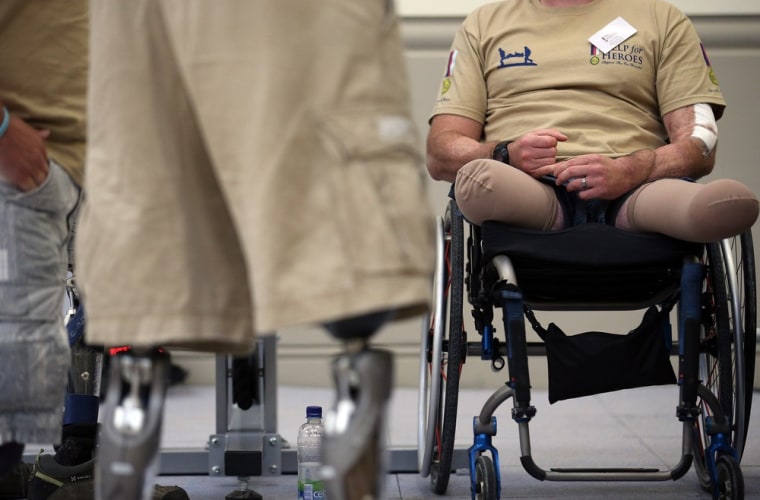 Luke Simmott sits in a wheelchair as he talks to visiting media in the new Help for Heroes' Tedworth House rehabilitation center on Oct. 18.