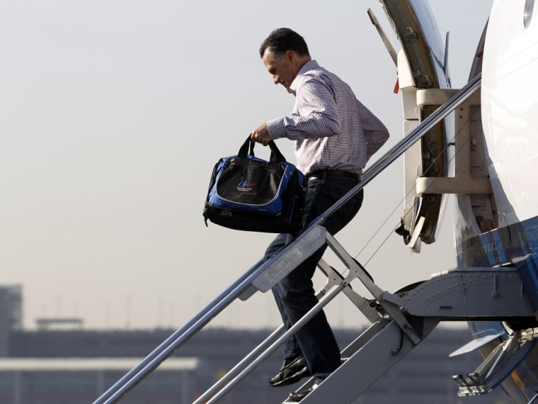 Republican presidential nominee and former Massachusetts Governor Mitt Romney steps off his campaign plane in Newark, New Jersey, October 18, 2012.