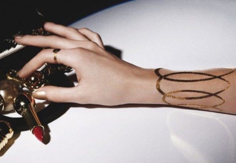 Temporary glamour? Dior now offers temporary jewelry-like tattoos made of 24-carat gold.