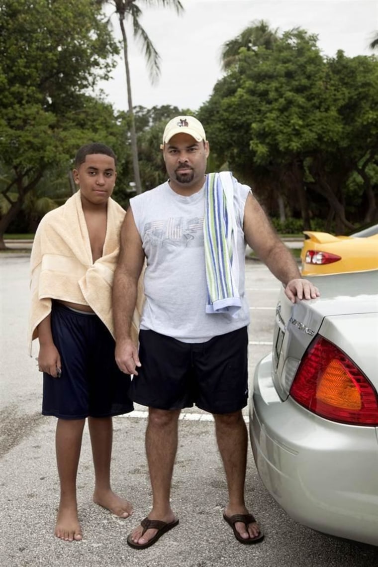 \"I voted for Obama last time, partly because he stood for a new racial tolerance, and I will stay with the devil I know than one we don't know,\" says Armando Rivas Senior, seen here with his son, Armando Jr.\"