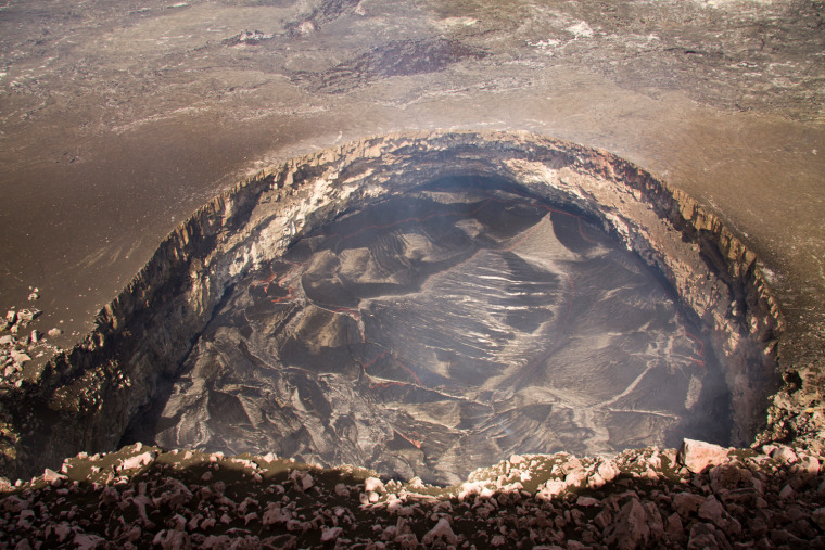 The lava lake in the 'overlook' vent in Halemaʻumaʻu reached to within 124.7 feet of the crater floor, filling the entire bottom of the vent on Oct. 19.