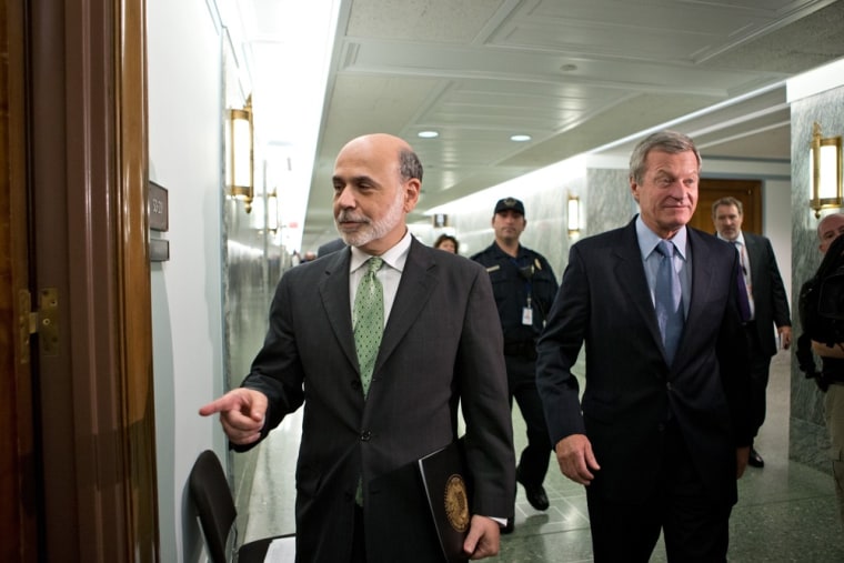 Is this the way out? Federal Reserve Chairman Ben Bernanke (shown above, left) may not seek a third term as the head of the central bank, The New York Times reports.