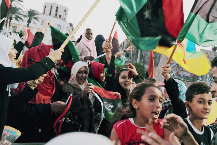 Libyans celebrate one year since the country declared liberation from former dictator Muammar Gaddafi, at Martyrs Square in Tripoli, Libya, Oct. 23.