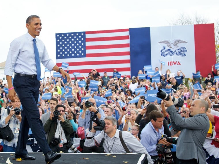 President Barack Obama arrives on stage for a campaign event October 24, 2012 at Mississippi Valley Fairgrounds in Davenport, Iowa.