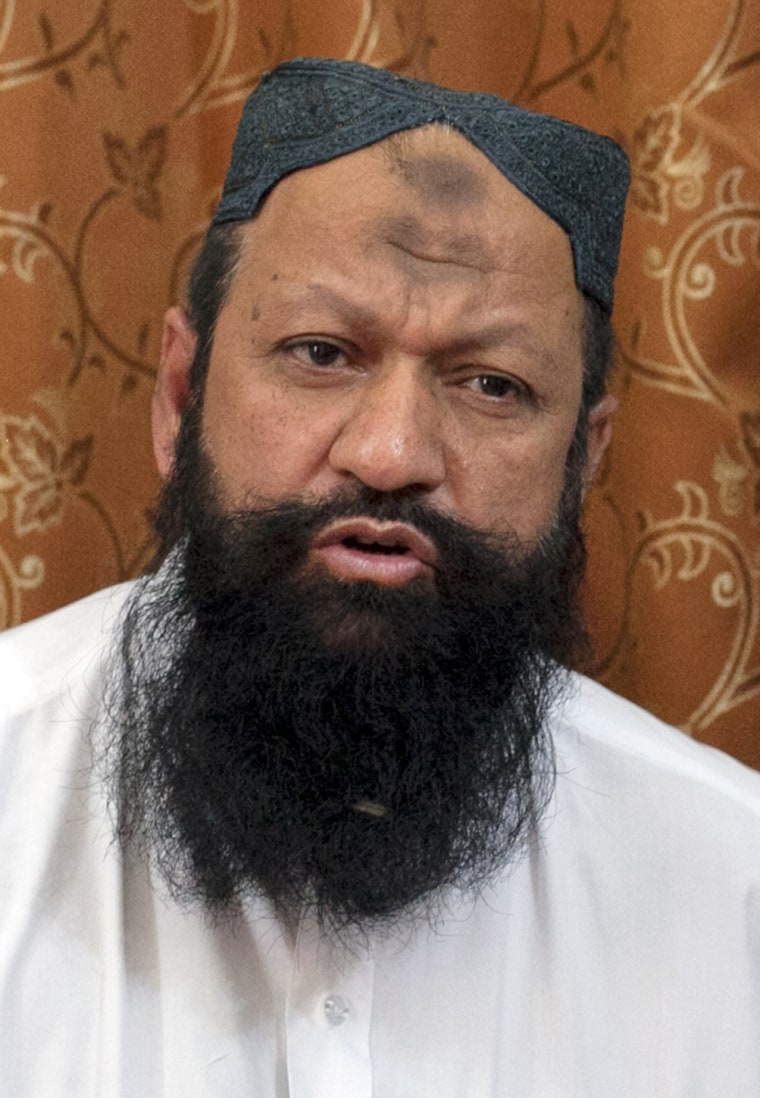 Malik Ishaq, leader of the Lashkar-e-Jhangvi, speaks during an interview with Reuters at his home in Rahim Yar Khan in southern Punjab province, on Oct. 9.