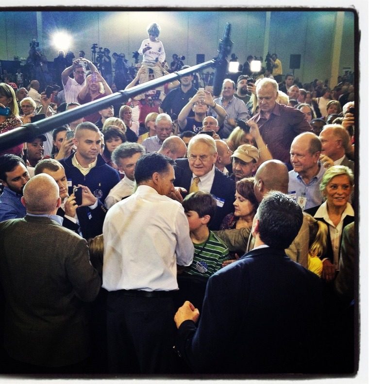 Republican presidential candidate, former Massachusetts Gov. Mitt Romney greets supporters during a campaign rally on Oct. 25, 2012 in Cincinnati, Ohio. (EDITORS NOTE: Image was created using an iPhone and processed with the Instagram application)