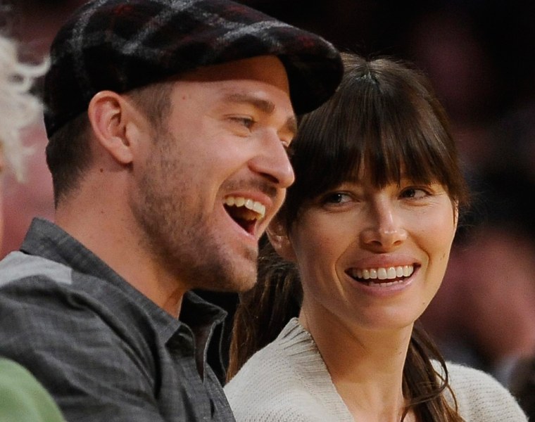 Justin Timberlake and Jessica Biel are all smiles at a Lakers basketball game in May. The couple recently got married in Italy.