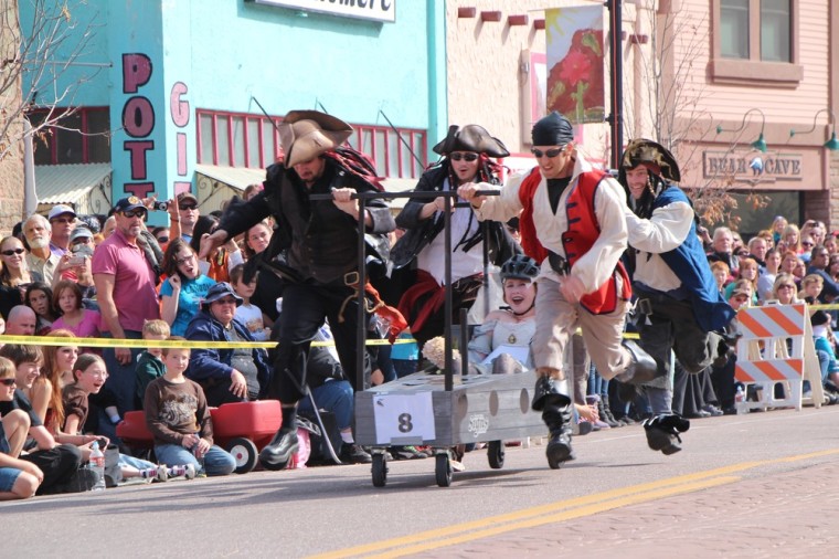 Shiver me timbers! A team dressed as pirates participates in the Emma Crawford Coffin Race in Manitou Springs, Colo.