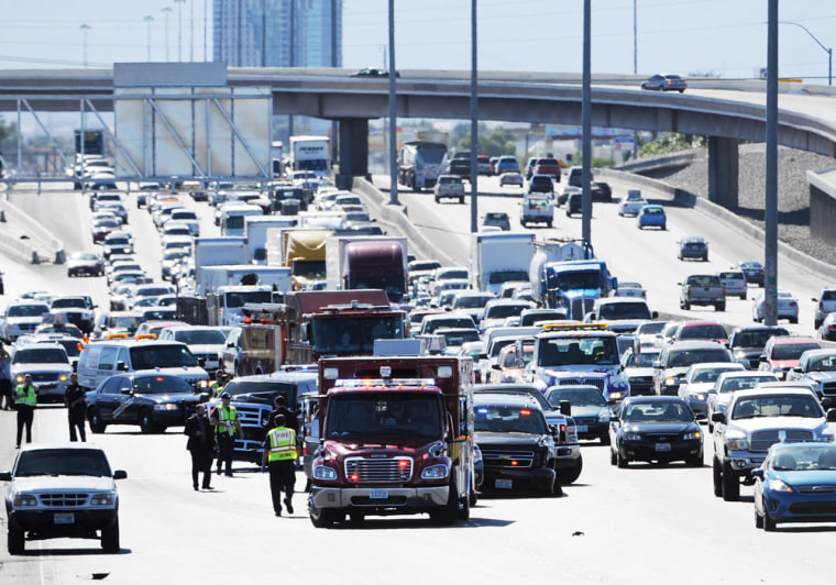 A multi-vehicle accident involving the caravan of U.S. Senate Majority Leader Harry Reid (D-NV) clogs traffic along Interstate 15 in Las Vegas on Friday.