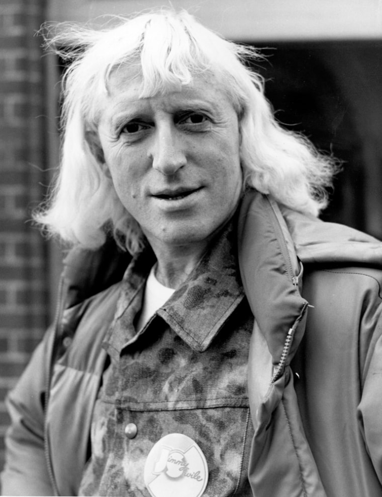 Jimmy Savile, seen here in 1973, was later knighted by Queen Elizabeth II for services to charity and entertainment and received a papal knighthood from Pope John Paul II.