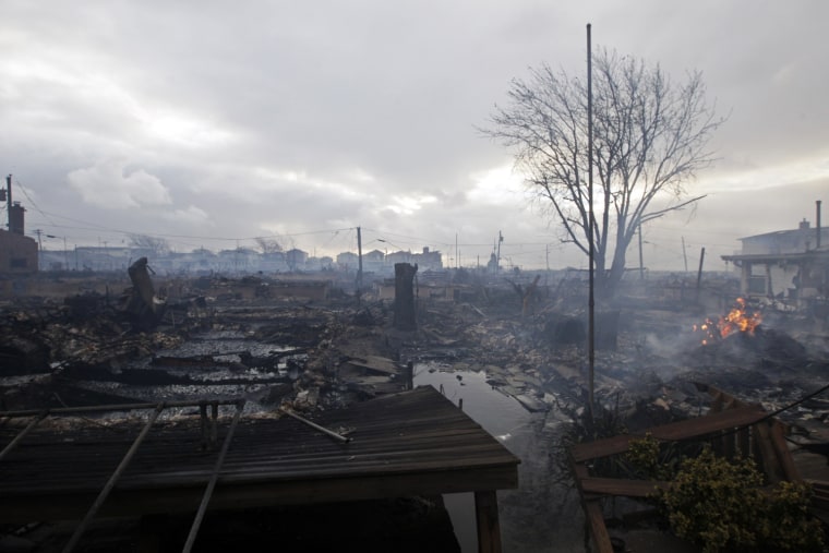 Damage caused by a fire at Breezy Point in Queens, N.Y. is seen Tuesday morning.