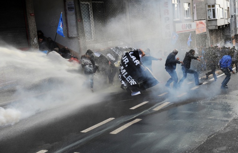 Turkish riot police fire a water cannon as they clash with Kurdish demonstrators during a protest in support of a hunger strike movement by Kurdish prisoners in Istanbul, Turkey, Oct. 30.
