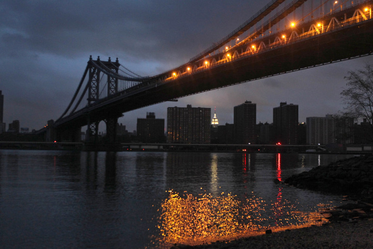 A blacked-out lower Manhattan is seen from the Dumbo neighborhood of Brooklyn on Oct. 30. Lower Manhattan is still suffering from widespread power outages and flooding from Hurricane Sandy.