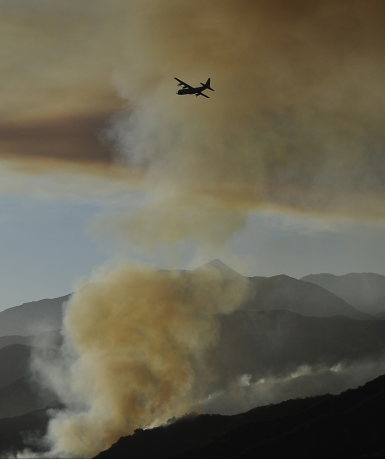 Wildfire grows, chases thousands out of Southern Calif. forest