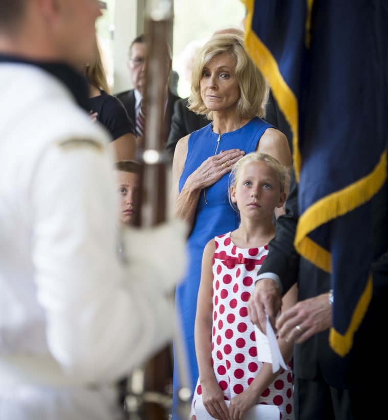 Carol Armstrong, wife of Neil Armstrong, and Piper Van Wagenen, one of 10 grandchildren, seen during a memorial service celebrating the life of Neil Armstrong, Friday, at the Camargo Club in Cincinnati. Armstrong, the first man to walk on the moon during the 1969 Apollo 11 mission, died August 25, 2012. He was 82.