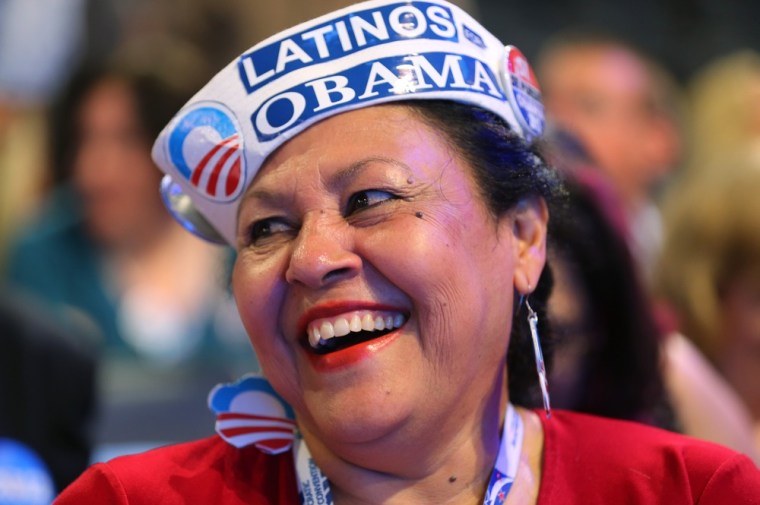 Delegate Antonia Gonzalez of Seattle, WA wears a Latinos for Obama hat at the Democratic National Convention at Time Warner Cable Arena on Tuesday.