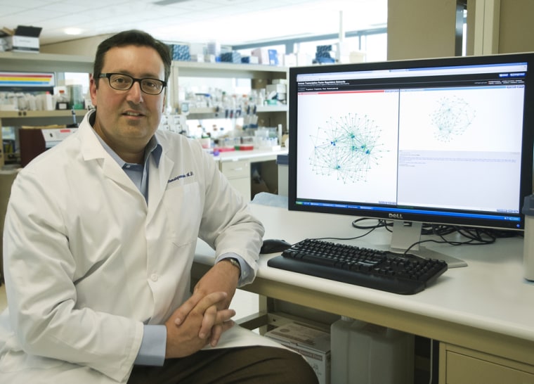 Dr. John A. Stamatoyannopolous, associate professor of genome sciences, in his lab. Stamatoyannaopolous worked on the giant ENCODE project that is re-defining human biology.