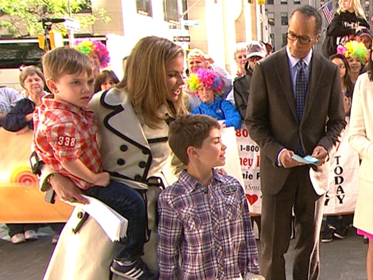 Natalie Morales with sons Luke (left) and Josh. Luke recently survived his first trip to the E.R. for stitches.