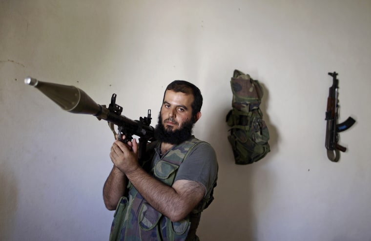 Portraits From The Frontline: Syrian Rebels Pose In Aleppo