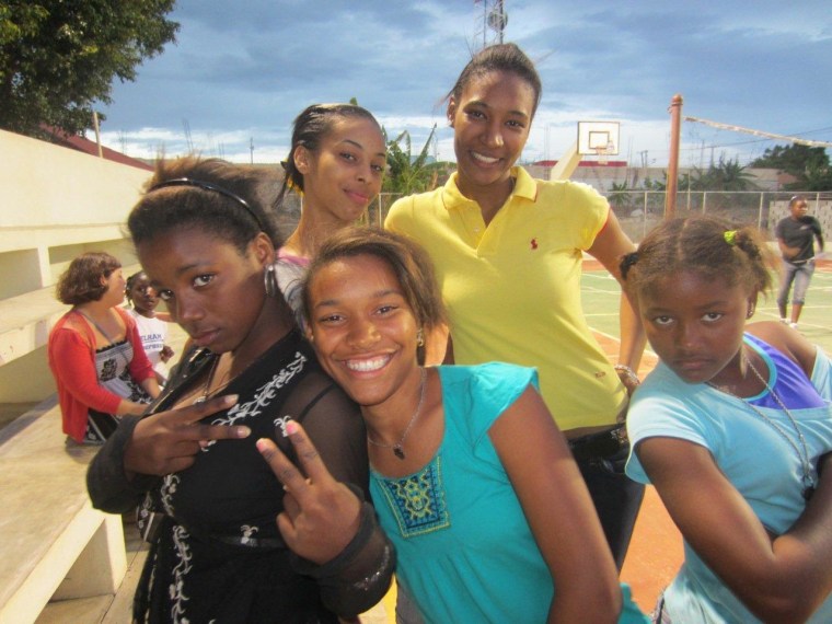 Fior Mendez (in yellow) as a teenager with her friends at the Orfanato Ninos de Cristo orphanage in La Romana, Domincan Republican.