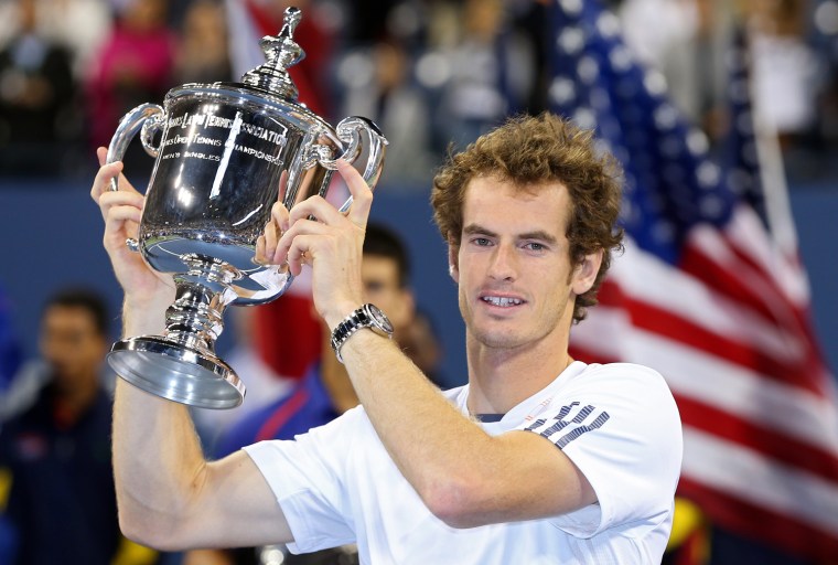 Andy Murray of Great Britain lifts the US Open championship trophy.