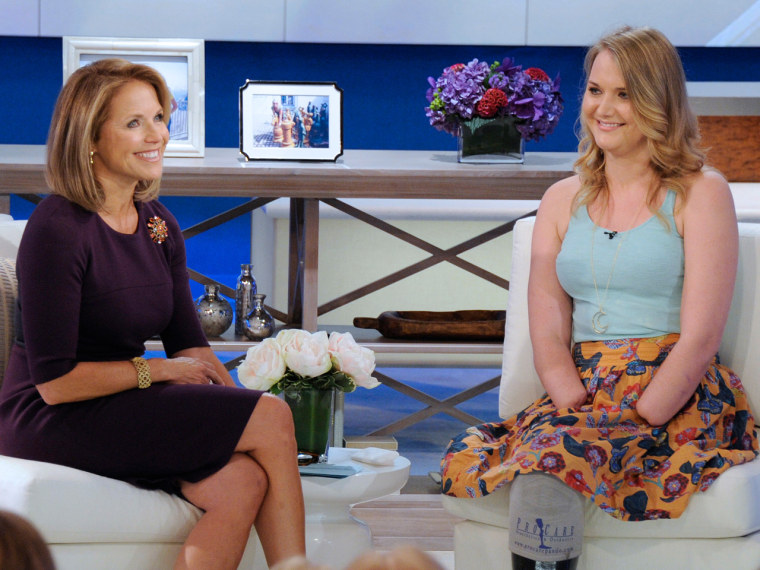 This image released by Disney-ABC Domestic Television shows host Katie Couric, left, with Aimee Copeland, 24, of Snellville, Ga., who survived a rare fleshing-eating disease, during an exclusive interview on the new daytime talk show \"Katie,\" on Tuesday in New York.