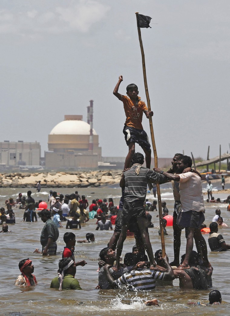 Demonstrators form a human pyramid in the waters of the Bay of Bengal near the Kudankulam nuclear power project in the southern Indian state of Tamil Nadu on Sept. 13.