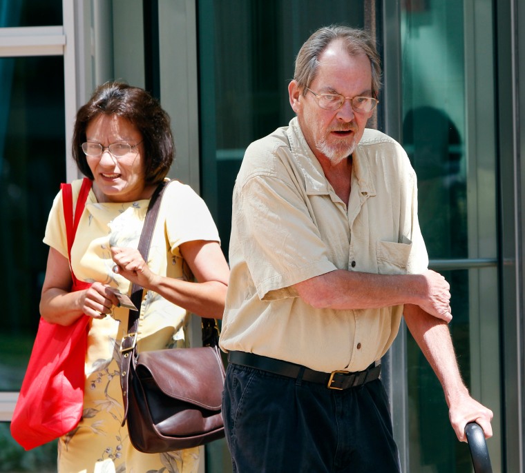 Richard Keller, right, and his wife leave the federal courthouse during a recess in his law suit trial against the Denver's Veterans Affairs Hospital in Denver on Wednesday, Aug. 18, 2010. Sixty-one-year-old Army veteran Richard Kellar had a triple-bypass surgery at the VA hospital in 2005 and the doctors  left a clamp in his chest. Kellar originally sought $15 million in damages but his lawyer said Wednesday that he's lowered the amount to $7.5 million in hopes of reaching a settlement.(AP Photo/Ed Andrieski)