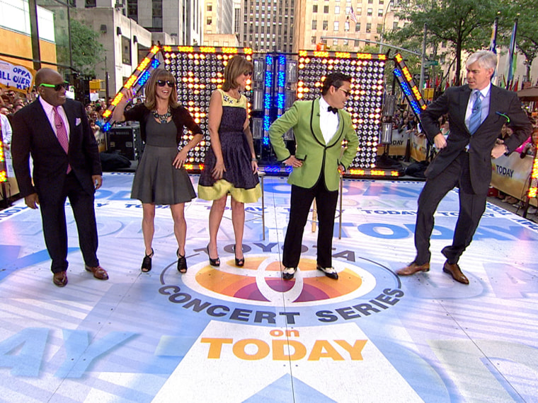 David Gregory (right) shows off his \"Gangham Style\" to the TODAY anchors and PSY.