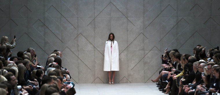 A model presents a creation during the Burberry Prorsum 2013 Spring/Summer collection catwalk show at London Fashion Week in London on Sept. 17.