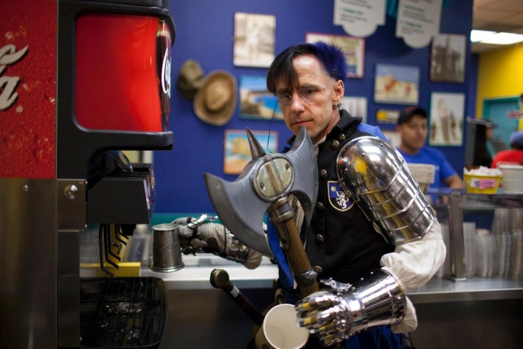 Jesse Skellington fills his chalice at a Taco Del Mar during Seattle's PAX convention, Sept. 1. Skellington is less cosplayer and more LARPer, or live action role player. Skellington takes on a persona all his own in lieu of characters from any franchise.
