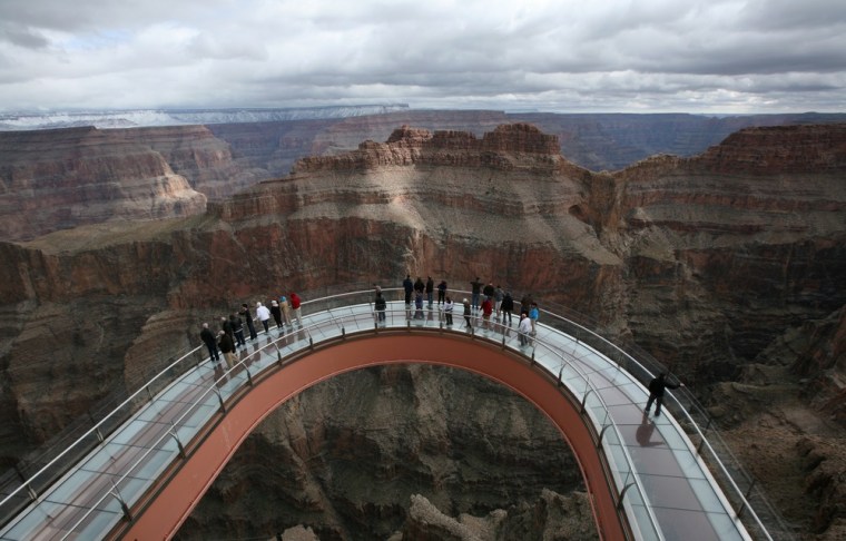 A skywalk extends out over the Grand Canyon in this photo taken Feb. 28, 2012, on the Hualapai Indian Reservation, Ariz. The number of international visitors to the United States rose 10 percent in the first three months of 2012.