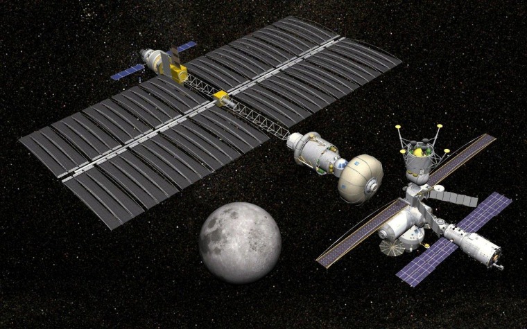 An artist's conception shows a deep-space transfer vehicle flying near a future exploration gateway platform at lower right.