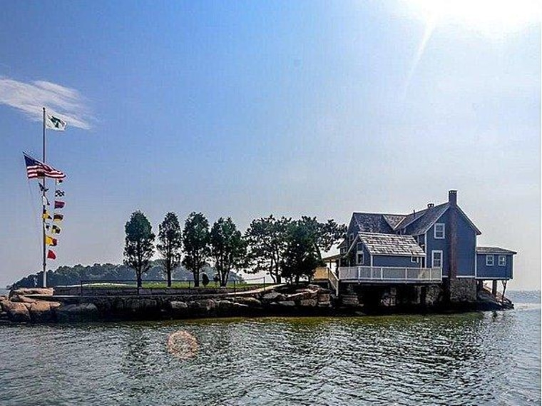 Belden Island, a two-acre island with home, is for sale.