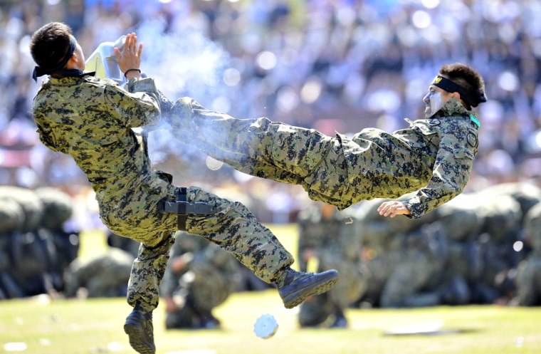 South Korean Special Army soldiers perform martial arts during a ceremony to mark the 64th Korea Armed Forces Day on Sept. 25.