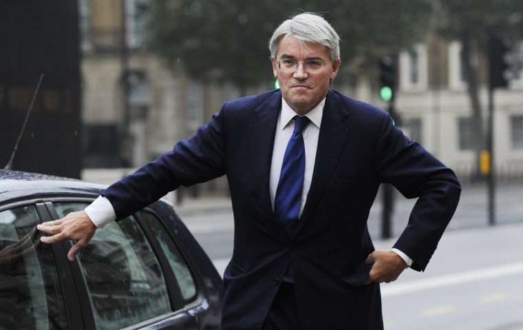 Andrew Mitchell speaks to the media in London on Monday.