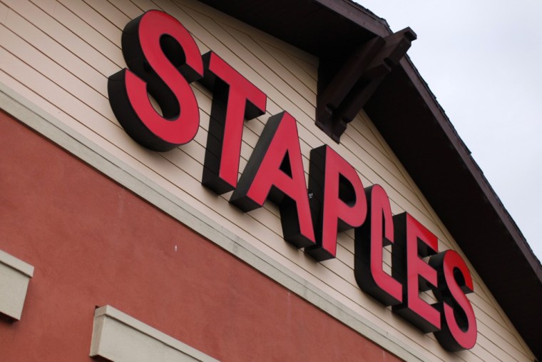 A Staples store is shown in Encinitas, California in this February 28, 2012 file photograph. Staples shares tumbled Tuesday after the company announced a major revamp, including store closures and a pretax charge.