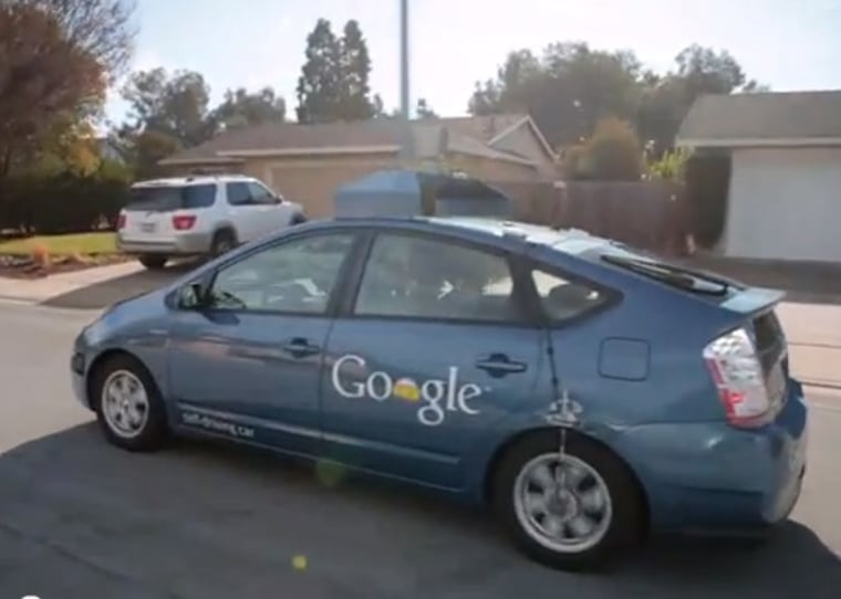 Google's self-driving car goes out for a spin.