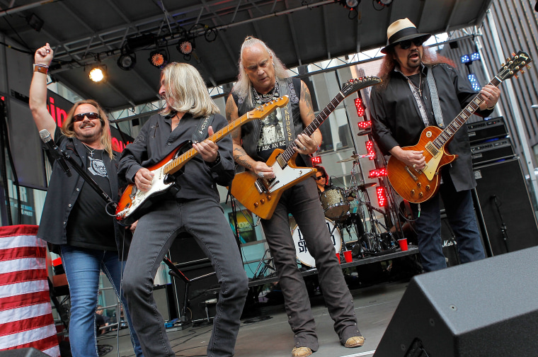 Lynyrd Skynyrd members, from left, Johnny Van Zant, Mark