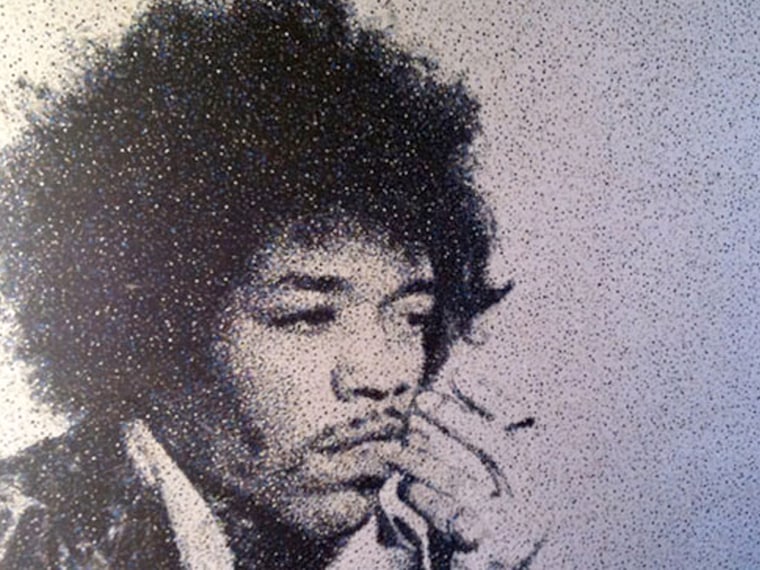 Douthwaite used 150,000 dots to make this image of Jimi Hendrix.