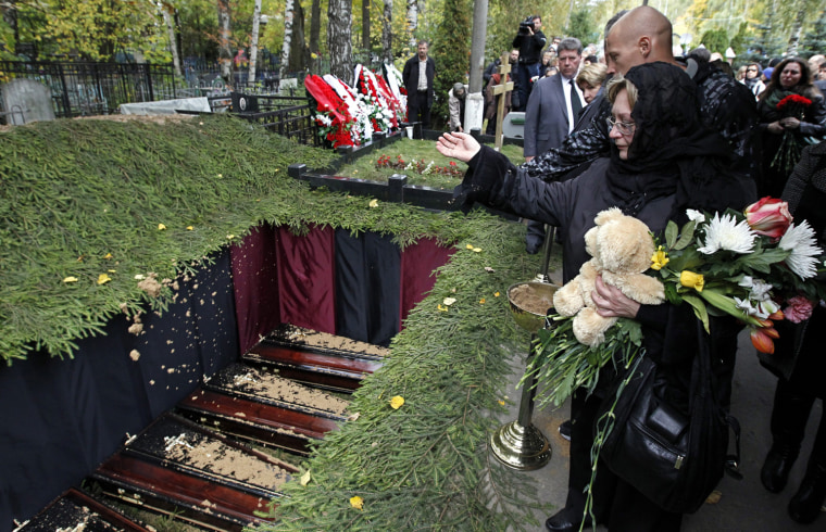 Five orphans killed by drunk driver laid to rest in Moscow