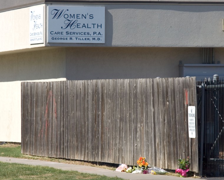 Flowers are seen in front of the Women's Health Care Services abortion clinic and serve as a memorial to Dr. George Tiller's death May 31, 2009 in Wichita, Kansas.