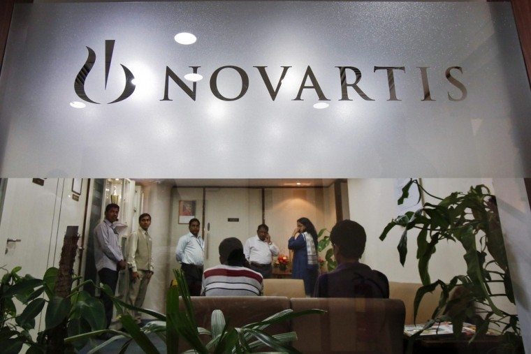 People gather at Novartis India headquarters in Mumbai April 1, 2013. India's top court dismissed Swiss drugmaker Novartis AG's attempt to win patent ...