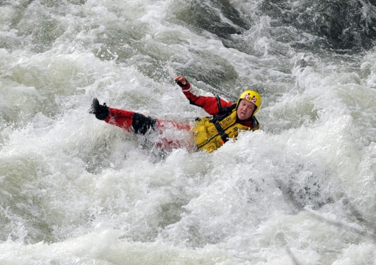 White water rescue attempt takes firefighter for wet ride